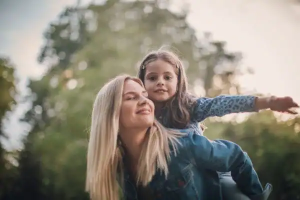 happy mum and daughter following mediation to resolve parental alienation Paignton
